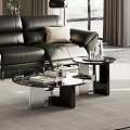 Two Coffee Tables With Black Leather Sofa Green Plant And Books In Living Room