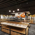 Modern Retail Store Interior Design With Wooden Display Shelves And White Showcases Lighting