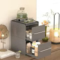 Modern Black Cabinet Interior With Open Drawers Displaying Tea Set And Accessories