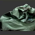 Pile Of Crumpled Green Woven Sacks With Textured Fabric And Used Appearance