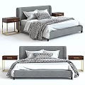 Elegant Grey Bed With Gold Leg Nightstands White Linens And Patterned Blanket