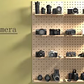 Various Camera Models Displayed On Pegboard Wall With Yellow Background And Storage Shelves 3d model