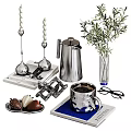 Decorative Ornament Set With Silver Candle Holders Metal Coffee Pot And Green Plant