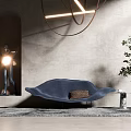 Blue Curved Single Sofa with Plush Design Potted Plant Hanging Light and Sculpture