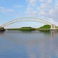 Modern White Arch Bridge With Metal Frame Spanning Water And Blue Sky Reflection