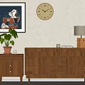 Modern Wooden Decorative Cabinet In Living Room With Plant Artwork Lamp And Side Table