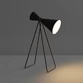 Modern Table Lamp With Conical Shade And Metal Tripod Stand Illuminated