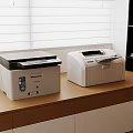 Modern Office Appliances Two Printers On Wooden Desk With Window Blinds In Background