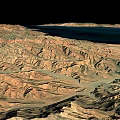 Natural Scenery Featuring Large Blue Lake And Surrounding Mountainous Terrain