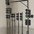 Outdoor Traffic Lights in Various Sizes with Green Lights Illuminated on Metal Poles