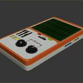 Orange Portable Computer With Green Screen Two Control Knobs And Interface Ports