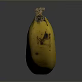 Ripe Yellow Banana With Brown Spots On Smooth Reflective Surface