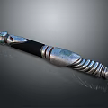 Silver And Black Metallic Weapon With Spiral Hilt Design And Reflective Surface