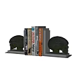 Stylish Books Arranged With Decorative Skull Bookends On Home Shelf Decor