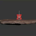 Hardware Tools Black Roller With Red Brackets And Metal Components On Rock Surface