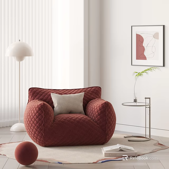 Red Quilted Lounge Chair with Light Pillow and Round Side Table with Green Plant 3d model 
