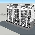 Multi Story Residential Building Exterior With Balconies And Units