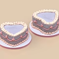 Two Heart Shaped Cakes With Pink And Beige Cream Decorations On White Plates