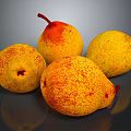 Fresh Ripe Juicy Yellow Red Speckled Pears on Dark Reflective Surface