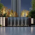 Modern Water Feature Wall with Cascading Water Nighttime Lighting Urban Trees and High-Rise Background