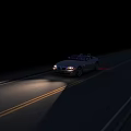 White Convertible Sports Car with Illuminated Red Taillights Parked On Dark Asphalt At Night