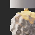Textured White Table Lamp With Gold Base And White Fabric Lampshade Design