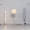 Various Modern Floor Lamps With Circular And Linear Designs In White Wall Interior
