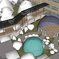 Modern Building Exterior Featuring Glass Dome Structure With Landscaped Trees And Lawn