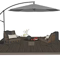 Outdoor Table With Two Chairs And Curved Umbrella On Wooden Deck With Decorative Items