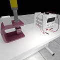 Purple Clamping Device And White Electronic Equipment With Red Wires On White Table Top