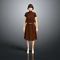 Child Wearing Brown Top And Skirt Standing Against Gray Background