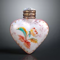 Elegant Heart Shaped Perfume Bottle With Colorful Floral Patterns And Metallic Cap
