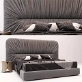 Gray Pleated Velvet Double Bed With Plaid Pillows And Dark Bed Sheets