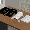 Four Black And White Landline Telephones Placed On Wooden Table For Office Use