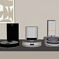 Modern Robotic Vacuum Cleaners On Table With Black And White Designs