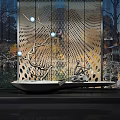 Garden Ornament With White Bowl Decorative Branch Blue Lights And Perforated Metal Screen