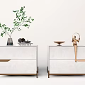 Modern White Nightstand With Gold Accents Drawer Design Green Plant Magazine Sculpture And Bowl