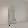 Full Length Standing Mirror with Metal Frame on Wheels in Minimalist Room