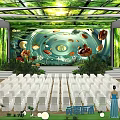 Indoor Event Venue With Green Decor Large Screen White Seats And Blue Dress Figure