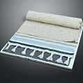 Woven Rugs With Tassels Stacked And Rolled In Beige And Blue Stripes