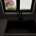 Kitchen Sink Area With Black Sink Faucet White Countertop Window Pink Flowers Green Plants