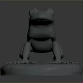Gray Frog Sculpture Sitting On Round Base With Detailed Legs Decorative Ornament