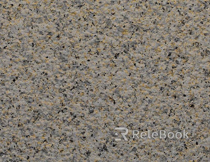 A close-up texture shot of granite, showcasing its characteristic flecks of white, grey, and black in a rugged, natural pattern. The stone's polished surface reflects light, highlighting its depth and complexity.