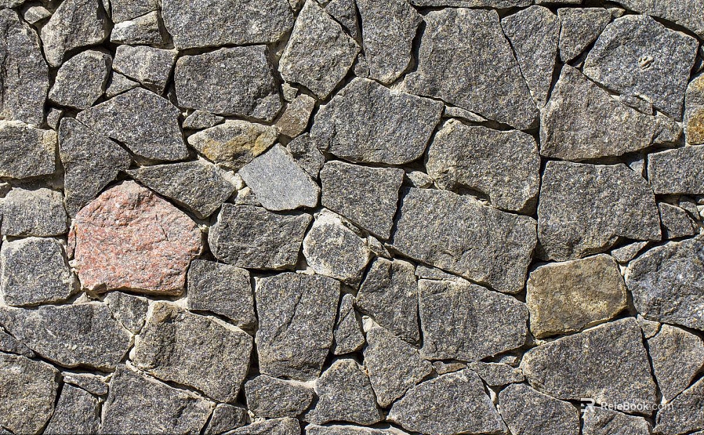 Dark gray irregular rubble stone for exterior wall texture