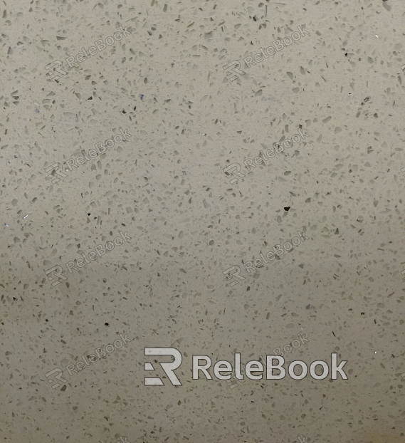 Close-up of a Terrazzo surface, a composite material featuring chips of marble, quartz, glass, and granite set in concrete or resin, presenting a speckled, textured appearance.