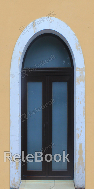 A vintage wooden door with intricate carvings and a distressed finish, adorned with antique metal hardware, evoking a sense of history and nostalgia.