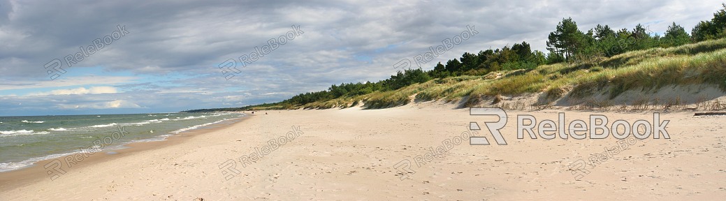 A serene seascape unfolds, showcasing a tranquil sea under a cloudy sky, with soft hues of blue and gray blending into the horizon, and gentle waves caressing the sandy shore.