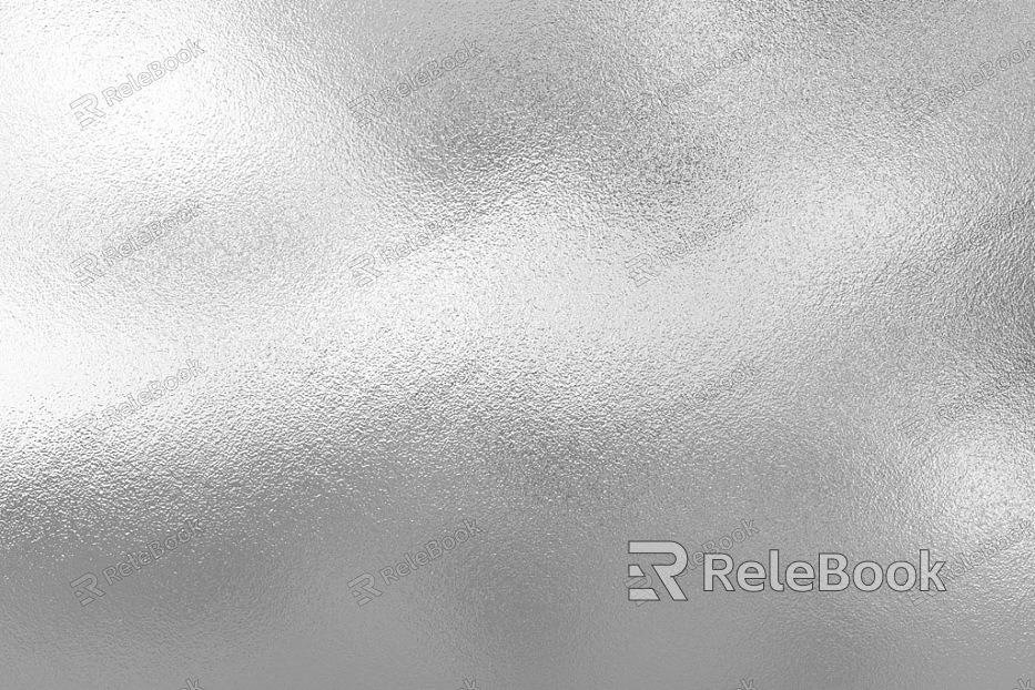 A textured image of frosted metal, showcasing a surface with a matte, icy finish, dotted with speckles and slight variations in tone, creating an industrial yet sophisticated aesthetic.