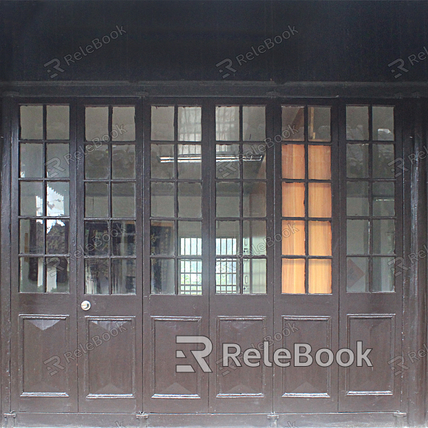 A vintage wooden door with intricate carvings and a distressed finish, adorned with antique metal hardware, evoking a sense of history and nostalgia.