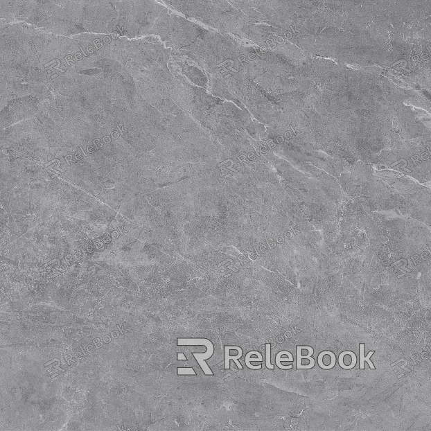 A close-up texture shot of granite, showcasing its characteristic flecks of white, grey, and black in a rugged, natural pattern. The stone's polished surface reflects light, highlighting its depth and complexity.